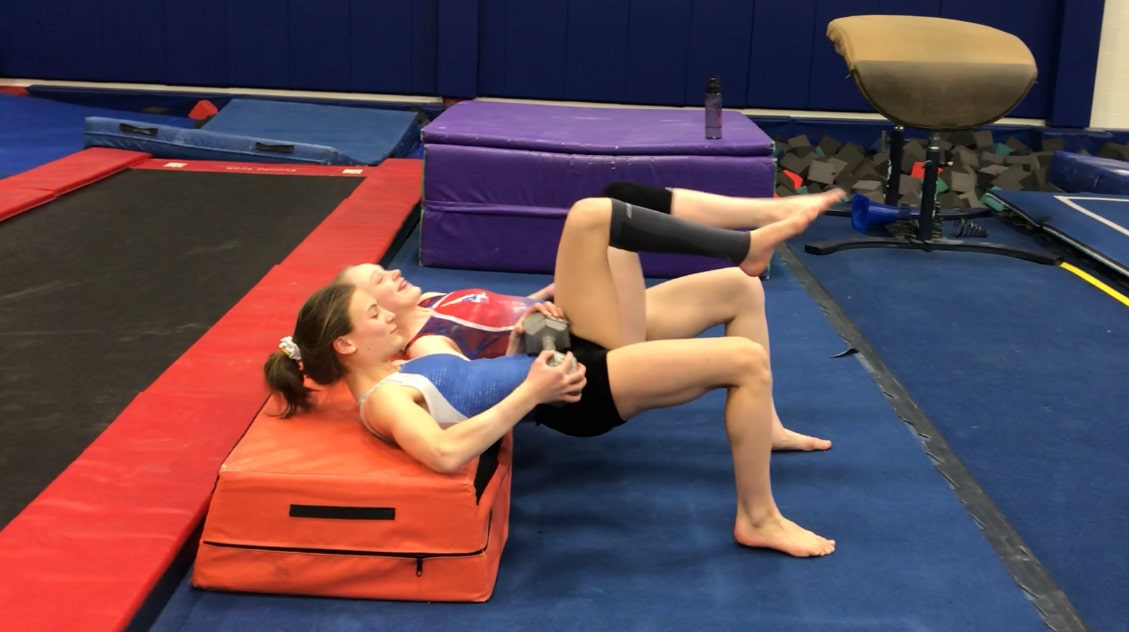 Increase Strength in Gymnasts with Weighted Hip Lifts